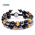 Detail of 10mm tiger eye and hematite double-layer beaded bracelet with woven cord - 10MM/Double Layer/Om Symbol Buckle / 10MM Yellow Tiger Eye + Black Agate + Hematite