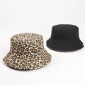 Detail view of double-sided bucket hat with leopard print and plain black canvas texture - M (56-58cm) / Khaki