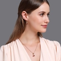 Elegant gold-tone cherry necklace and earrings set with red crystals on gray background - Cherry Necklace and Earrings Set / Red