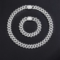 Detailed view of silver-toned hip hop Cuban chain set with pave crystals on black leather - 8inch Bracelet + 18inch Necklace / Silver