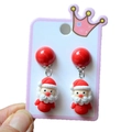 Detail of resin Santa Claus earrings with red beads on a display card setup - Style 13 3D Santa Claus Dangle