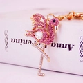 Pink rhinestone crane bird keychain with gold plating and crystal accents for women's bags - Pink