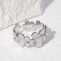 Anillo de flor plateado en acero inoxidable con diseño ajustable sobre piedra - Color Acero