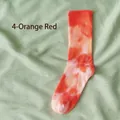 Orange tie-dye crew socks in a vibrant gradient pattern for street style fashion - Orange Red