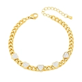 Gold Cuban chain bracelet with five pavé heart charms and sparkling white zircons - Bracelet
