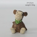 Brown resin monkey figurine with green polka dot scarf for succulent pot decoration - Monkey with Green Scarf