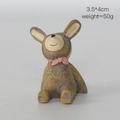 Miniature brown resin rabbit figurine with pink bow tie looking up 3.5x4cm size - Rabbit