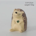 Miniature resin hedgehog figurine with green clover clover, size 3.5x3.5cm, weight 50g - Hedgehog