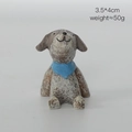 Miniature brown dog resin figurine with blue polka dot scarf, size 3.5x4cm, 50g weight - Dog with Blue Scarf