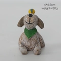 Miniature resin brown dog figurine with green scarf and tiny bird on head, size 4x4.5cm - Dog with Ball
