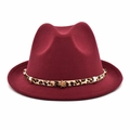 Close-up of red wide brim wool fedora hat featuring leopard print band and gold star ornament - M / 56-58cm / Burgundy