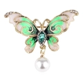 Elegant gold butterfly brooch with green enamel wings and a hanging white pearl charm - Green