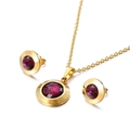 Conjunto de collar y pendientes redondos dorados con elegantes gemas de color púrpura - Morado