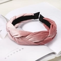 Detailed close-up of pink velvet braided headband with soft gradient texture and braided weave - Pink