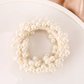 Elegant white pearl hair tie and bracelet with elastic fabric base on a tray - 1# Pearl White Shell