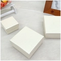 Three square cream beige jewelry gift boxes with elegant linen texture for rings and necklaces - Off-white