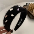 Plush black headband featuring rhinestones and a silver rose pendant for elegant hair styling - Black