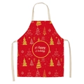 Detail of red linen Christmas apron with gold Happy Holidays print and tree patterns - Red Happy Holidays (WQ01-6)