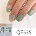 Detail of green matte nail stickers with gold foil accents and QF535 sheet - QF535