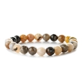 Natural zebra stone beaded bracelet with earth-toned mineral beads on white background - Bamboo Leaf Agate