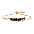 Detailed macro view of the gold-plated chain and the adjustable slide clasp on the bracelet - Gold & Tiger Eye