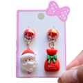 Detail of Christmas clip-on earrings with Santa and gift bag charms on card - 2# Asymmetric Santa & Gift Bag / Clip-on Earrings Pair