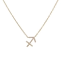 Macro view of gold Sagittarius zodiac pendant with micro-inlaid cubic zirconia crystals - Gold Sagittarius