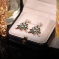 Macro shot of colorful rhinestone Christmas tree earrings with star tops in a gift box - D0308 Tassel Christmas Tree