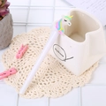 Cute white unicorn gel pen with glowing LED light and colorful silicone mane detail - Light-up Rouge Unicorn White