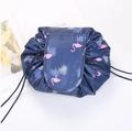 Lazy drawstring cosmetic makeup bag with flamingo tropical leaf print detail for travel storage. - Navy Flamingo