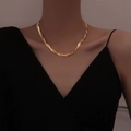 Three-layer gold snake bone necklace in titanium steel worn on model's neck - Double-layer Woven Gold