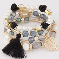 Multilayer bohemian bracelet set with pearls, crystals, black flower and leaf charms - Black