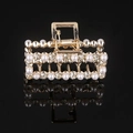 Close-up of golden hollow rectangle hair claw with white pearls and sparkling rhinestones - Gold Rhinestone & Pearl Square Claw Clip