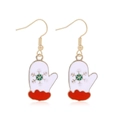 Christmas glove earrings in white enamel with red trim and green snowflake pattern - Christmas Mittens