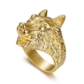Mens gold-plated stainless steel wolf head ring with detailed animal carving on white background - US 10 / Gold