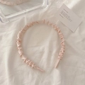 Elegant pleated pink satin headband for women shown on a soft white fabric background - Light Pink
