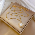 Halskette mit Sternanhänger, Perlmutt-Inlay und Goldperlen auf Geschenkbox - Gold (M411 Gold)