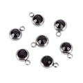 Detail of round silver birthstone charms with dark multifaceted crystals for DIY jewelry - Deep Red Silver Base