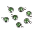 Detailed view of round green birthstone pendants with silver stainless steel settings - Green Stone Silver Base