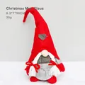 Gnomo di Natale femminile in piedi con cappello rosso a cuore e vestito grigio - Mamma Natale