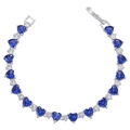 Macro detail of heart-cut blue zircon bracelet with silver-plated chain and secure clasp - Platinum Blue Zirconia