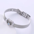 Pulsera de malla plateada con amuleto de ojo turco corazón y cierre ajustable - Color Acero