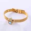 Pulsera dorada con mano de Fátima y ojo turco con cristales de colores en malla metálica - Dorado
