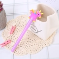 Cute light-up purple unicorn gel pen with pink silicone topper on lace coaster - Light-up Colorful Mane Unicorn Purple