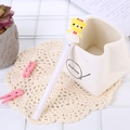 Cute white unicorn gel pen with glowing yellow bear character on top for school - Light-up Skirt Bear White