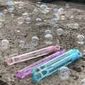 Star-topped bubble wands in pink, purple, and blue colors, measuring 10.5cm in length - Blow-proof Bubbles