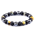Macro shot of 8mm hematite, obsidian, and tiger eye beads on an energy yoga bracelet - Yellow Tiger Eye Hematite Style (Style-01)
