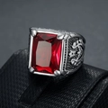 Macro detail of men's vintage silver ring with large square red gem and tulip engraving - Number 7 / Red