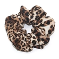 Classic leopard print hair scrunchie with silky texture shown in flat lay on white background - Leopard Print Style A