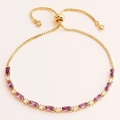 Detail of adjustable gold bracelet with purple rectangular and white round zircons - Sliding Clasp / Purple Adjustable Bracelet